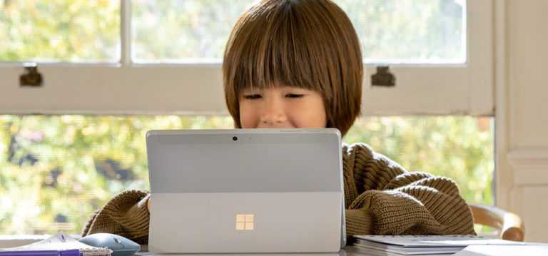 Child using a Microsoft Surface.