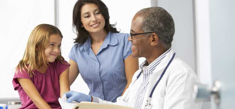 A doctor talking to a patient.