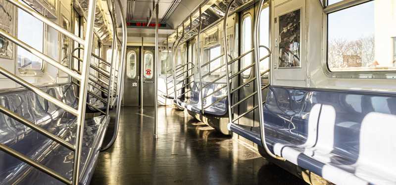 The inside of a subway car