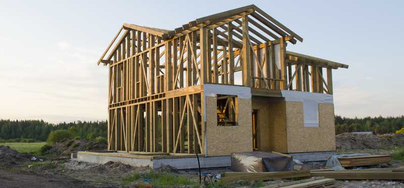 Wooden frame of house during construction.