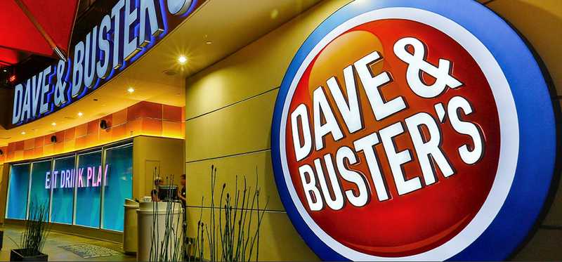 An illuminated Dave & Buster's store location.