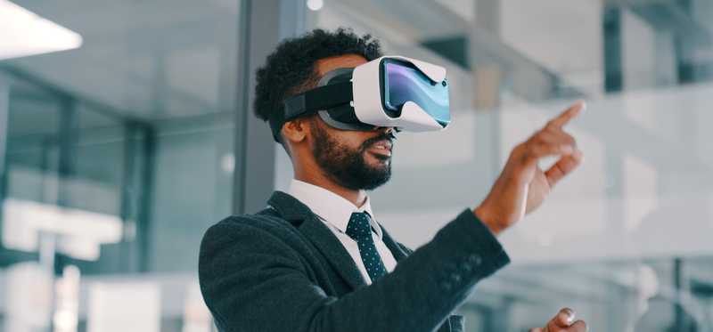 Person wearing virtual reality headset.