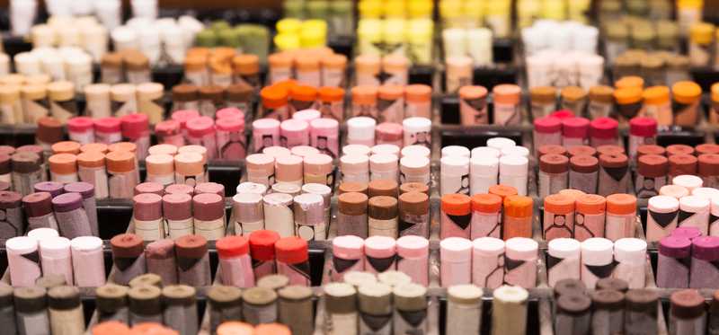 A bin of art supplies in different colors