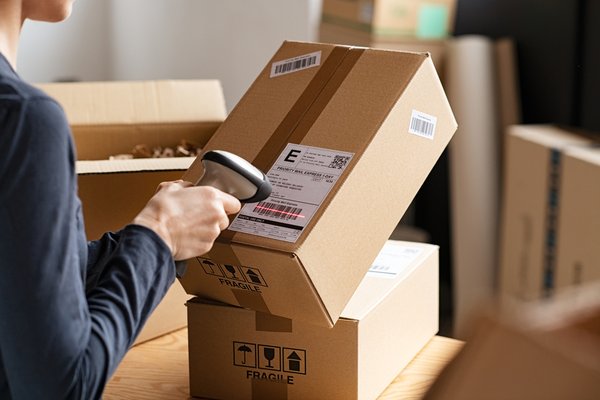 Person scanning packages