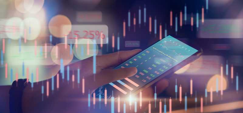 Person looking at stocks on phone.