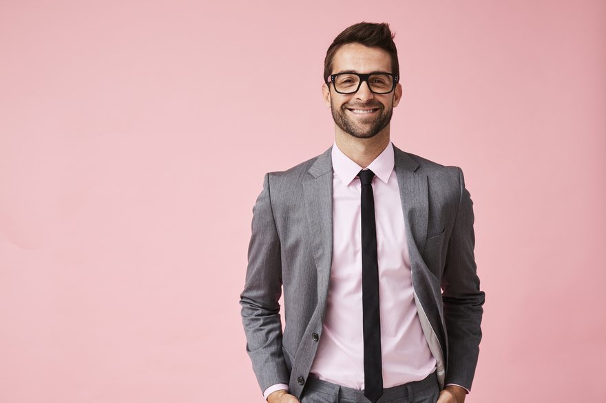 Smiling man in a business suit.