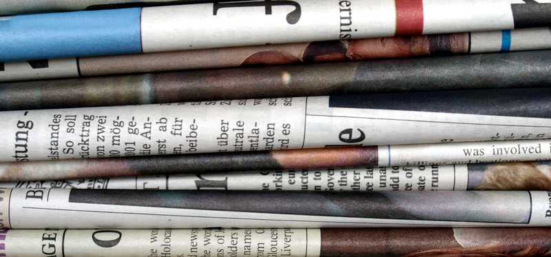 A stack of newspapers.