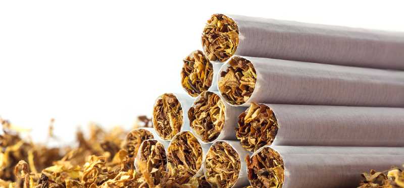 A stack of open tobacco cigarettes.