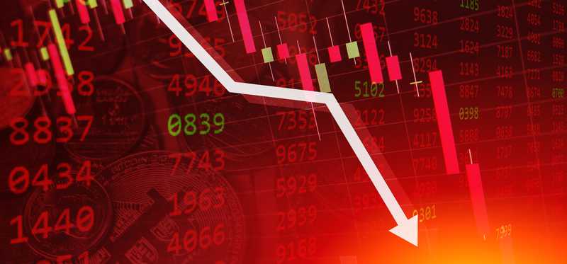 Stock market chart with down arrow