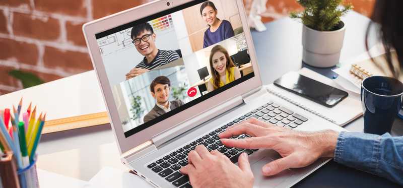Online meeting on laptop computer