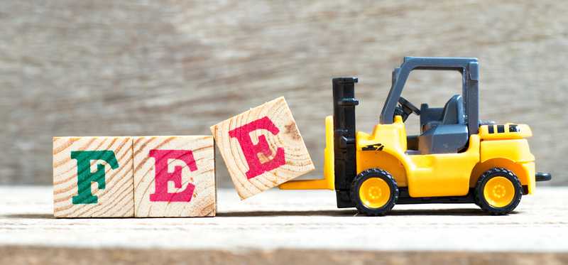 Toy truck hauling block letters that spell Fee