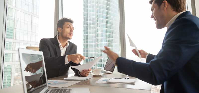 Two businessmen arguing.