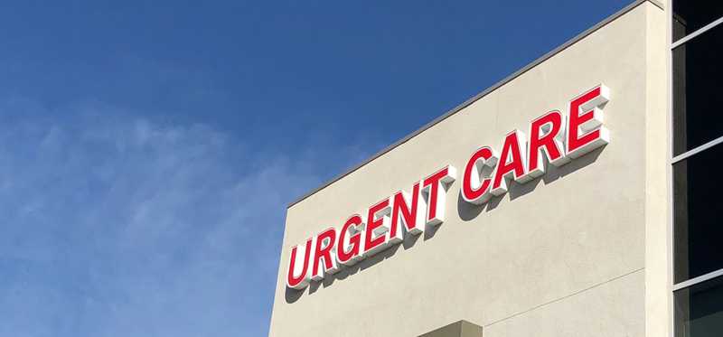 Sign on building says Urgent Care.