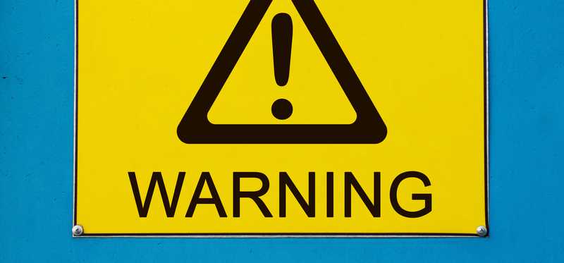A sign reads warning