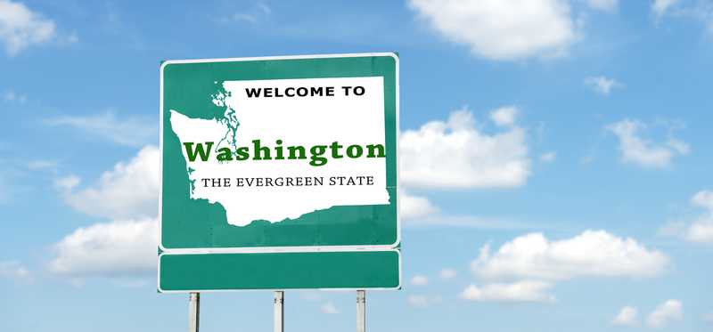Sign saying Welcome to Washington, The Evergreen State.