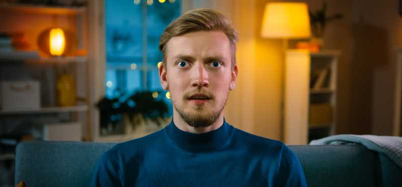 Young man staring straight ahead