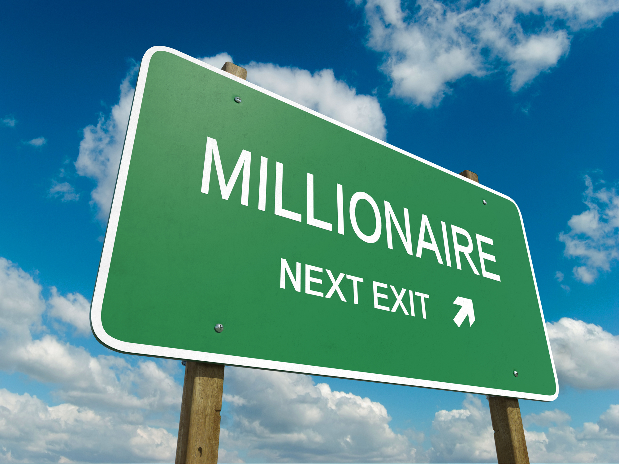 Road sign that says Millionaire Next Exit.