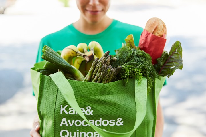 Person delivering food for Instacart. Person delivering food for Instacart.