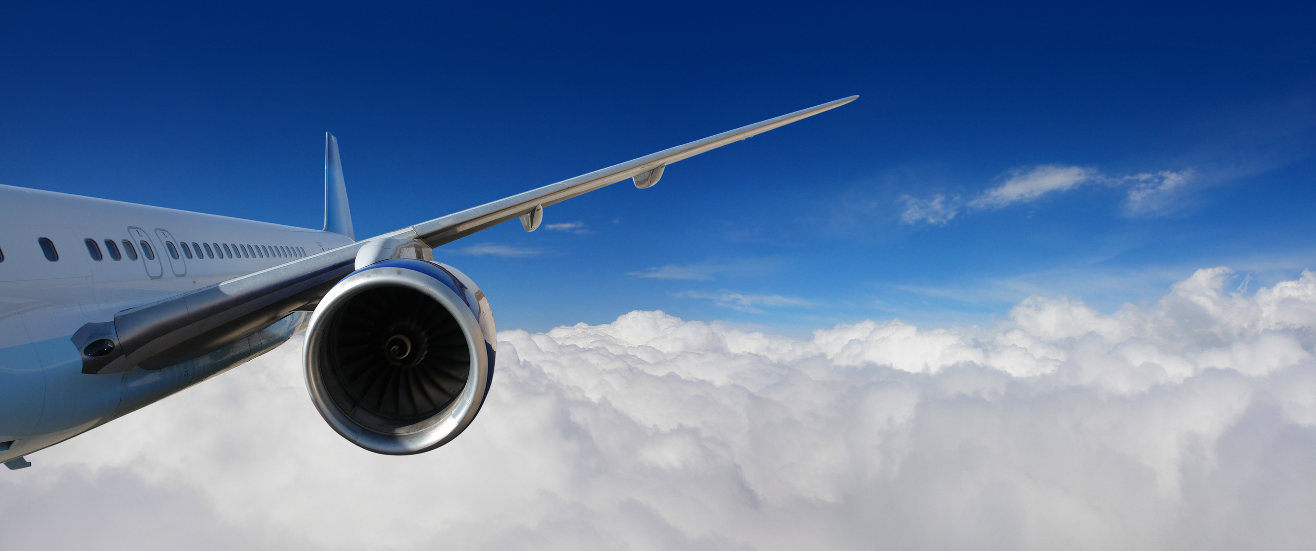 Jet engine on plane in clouds Jet engine on plane in clouds.