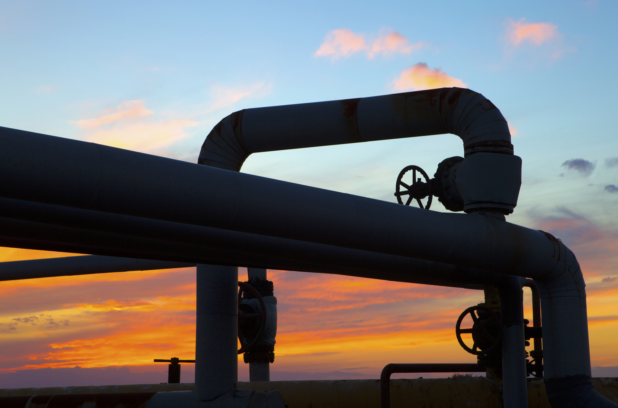 A looping pipeline with the sun setting in the background. A looping pipeline with the sun setting in the background.