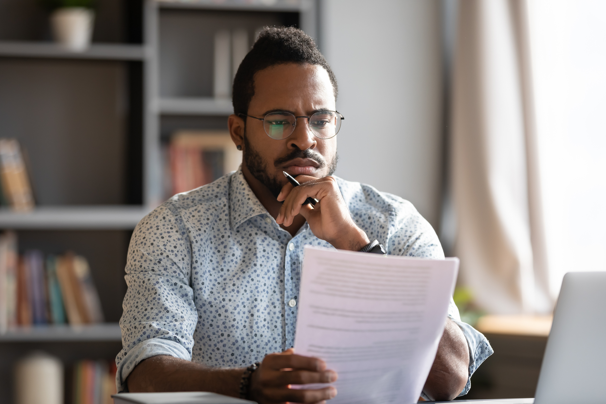 A person looking at documents