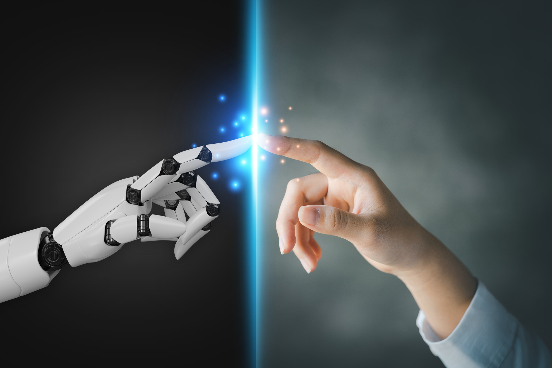 An AI-powered robotic finger and a human finger touch. A human and artificial intelligence robot touching index fingers.