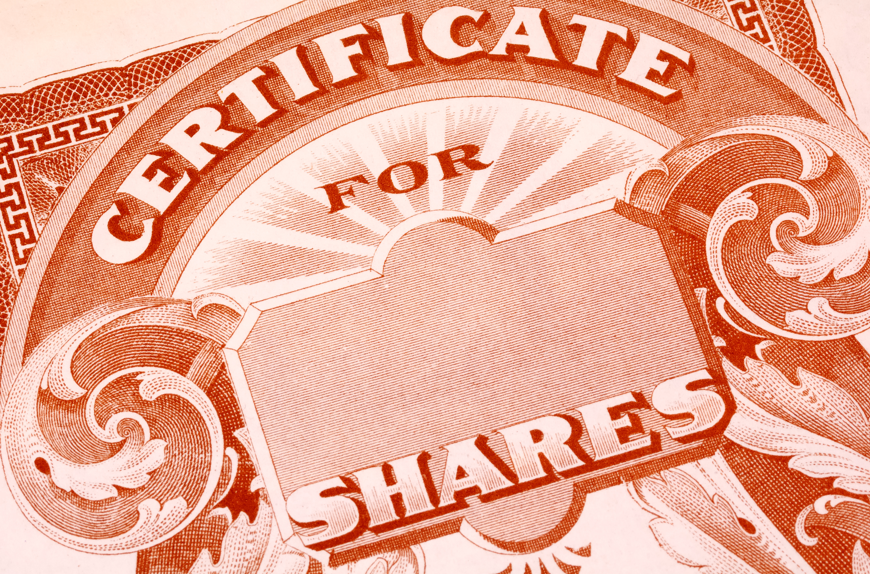 An up-close view of a paper stock certificate. An up-close view of a paper stock certificate.