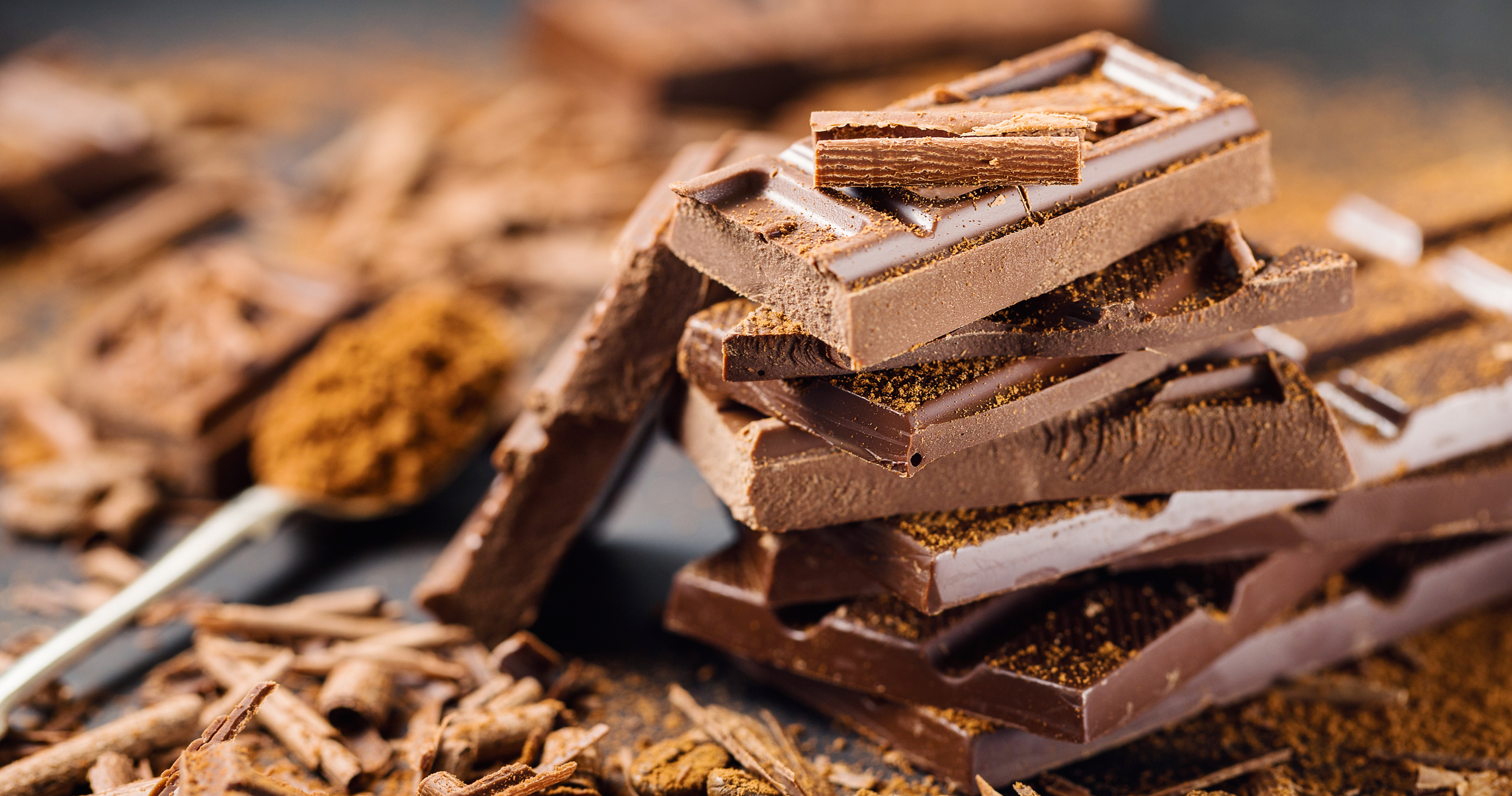 Candy Bars of chocolate and chocolate shavings.