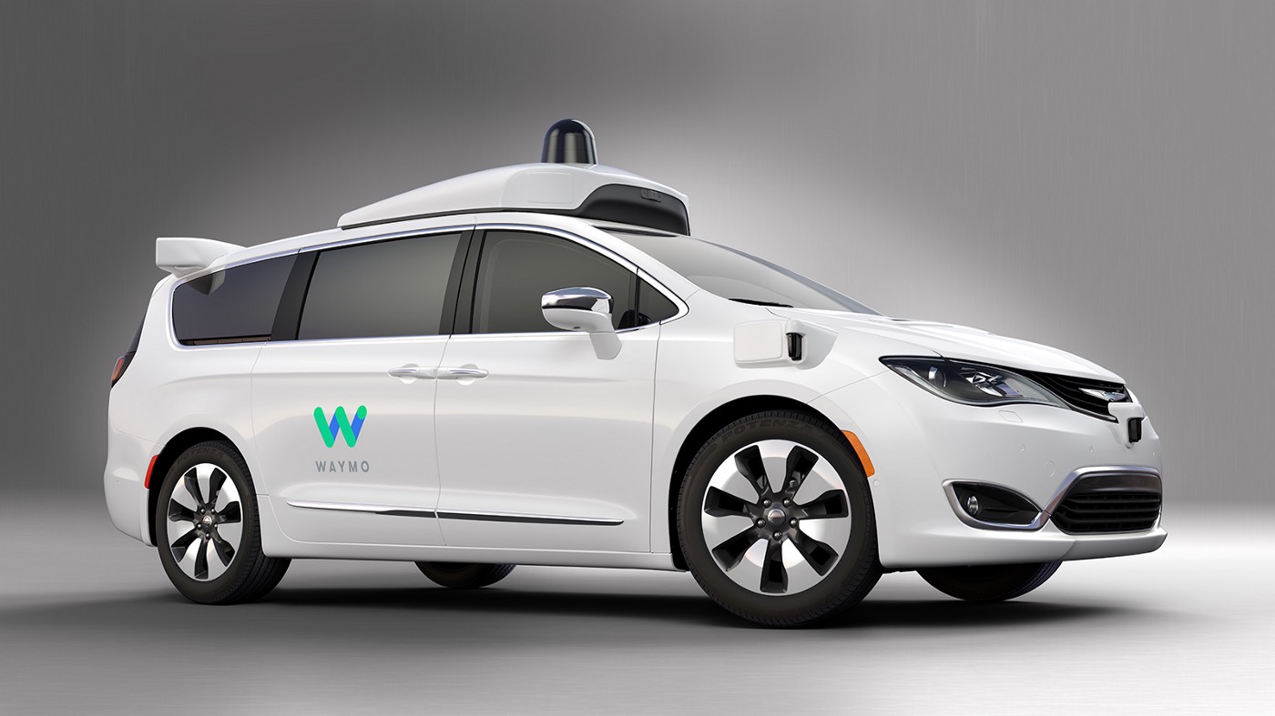Driverless self-driving car A white Waymo self-driving car