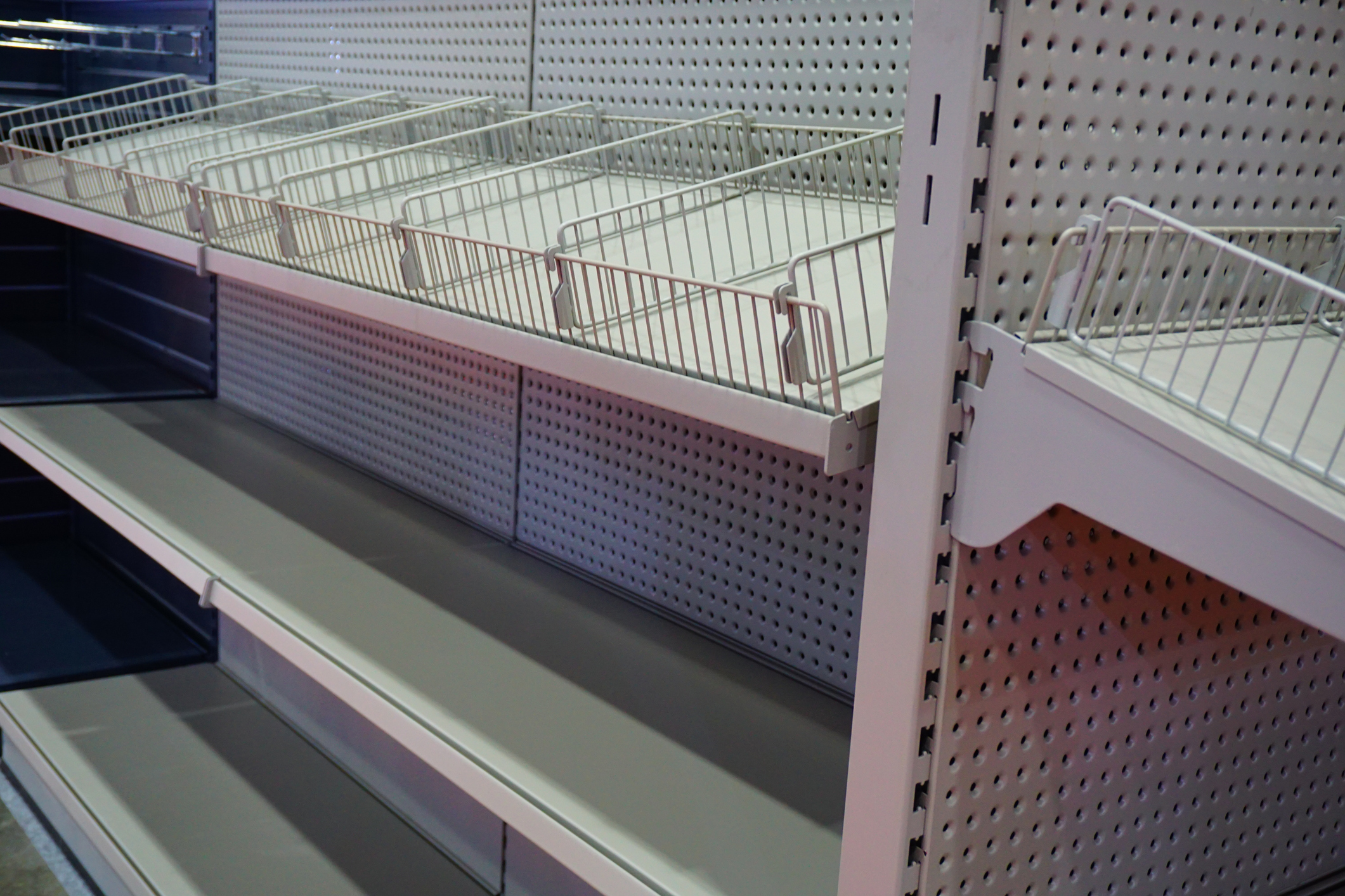 Empty shelves in a store. Empty shelves in a store.