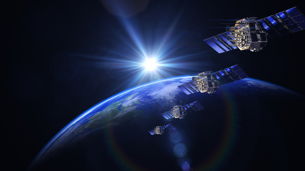 satellites orbiting space over the Earth Satellites orbiting space over the Earth.
