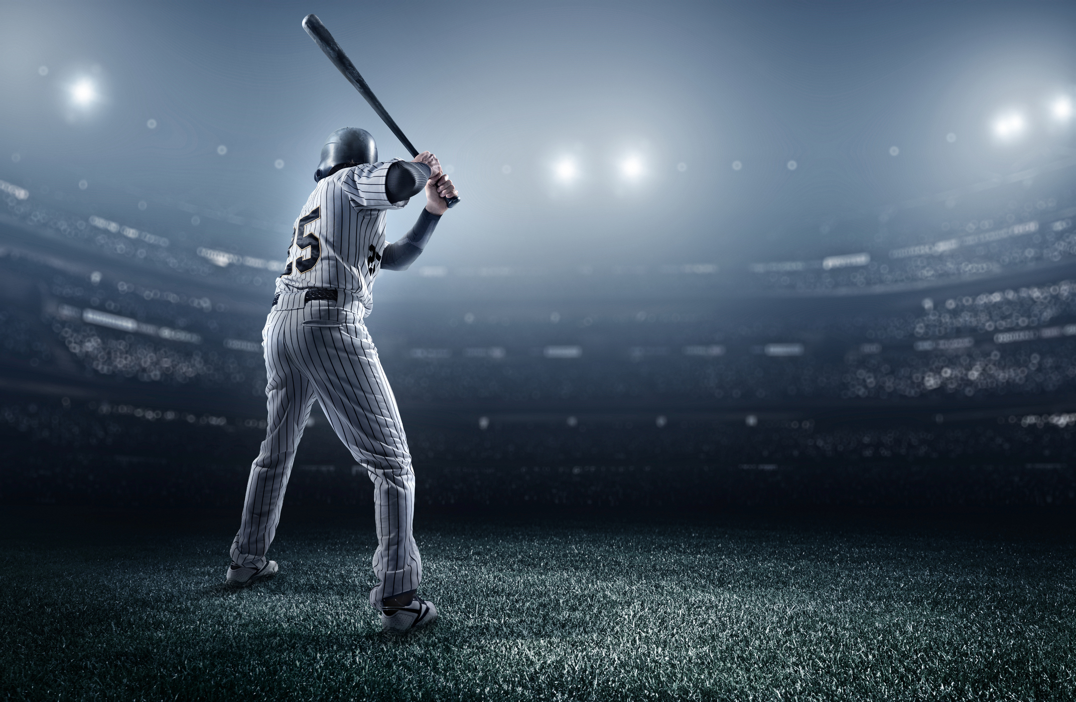 Getty - swing fast pitch baseball wait patience home run.jpg A batter in a baseball stadium waiting for the pitch.