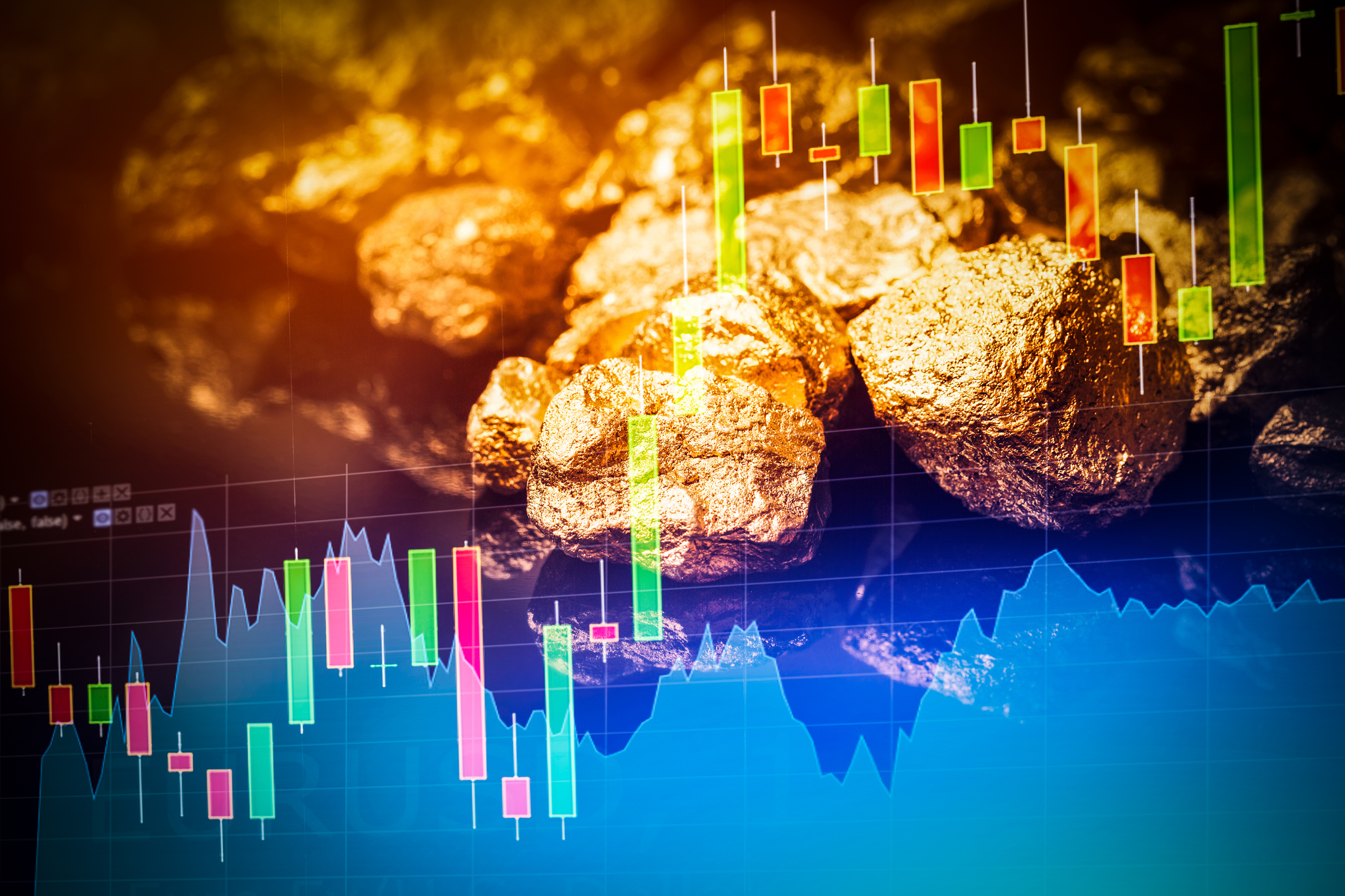 Gold nuggets on black stock market background Gold nuggets with a stock chart in the foreground.