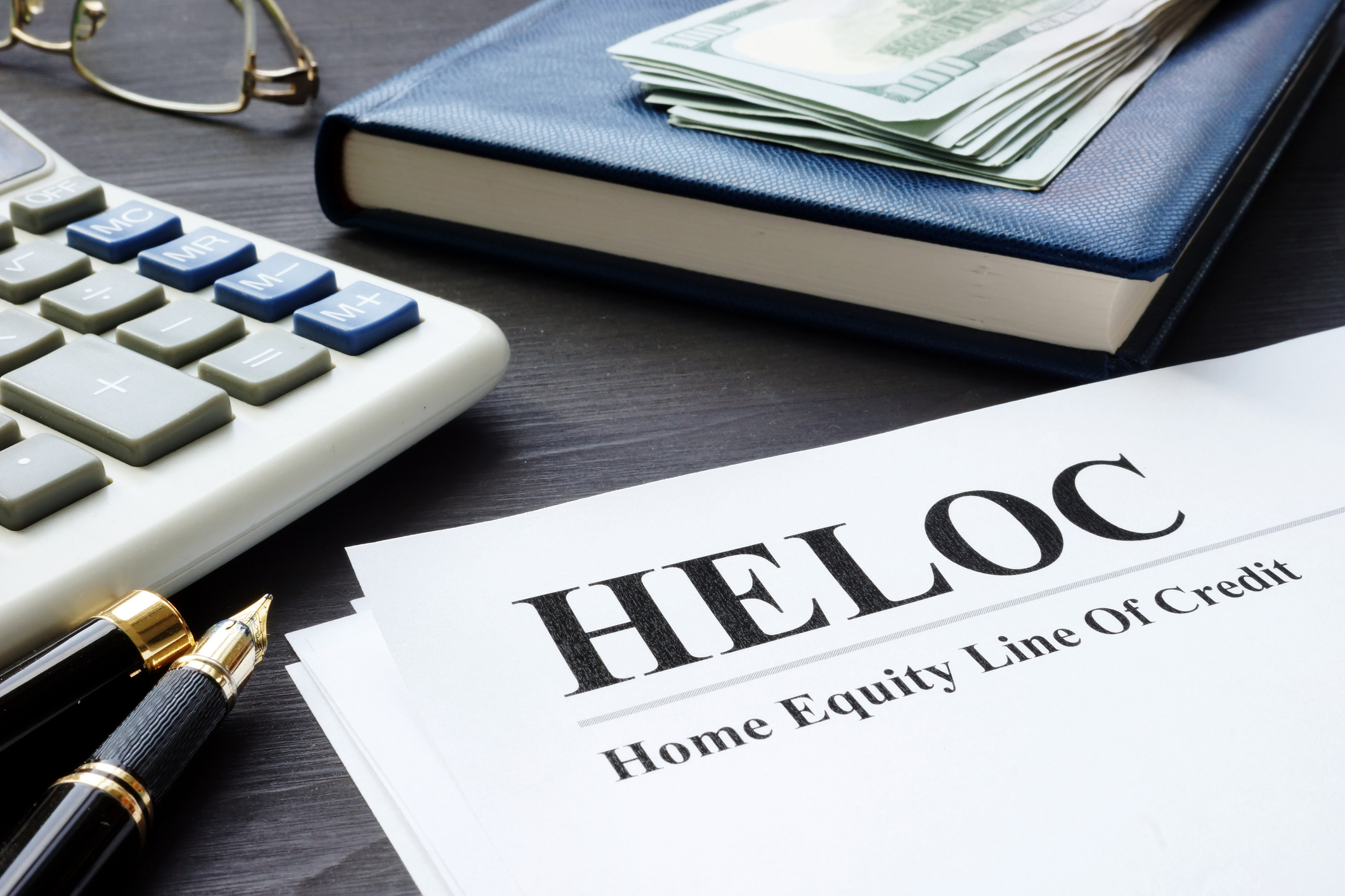 HELOC Home equity line of credit documents on a table.