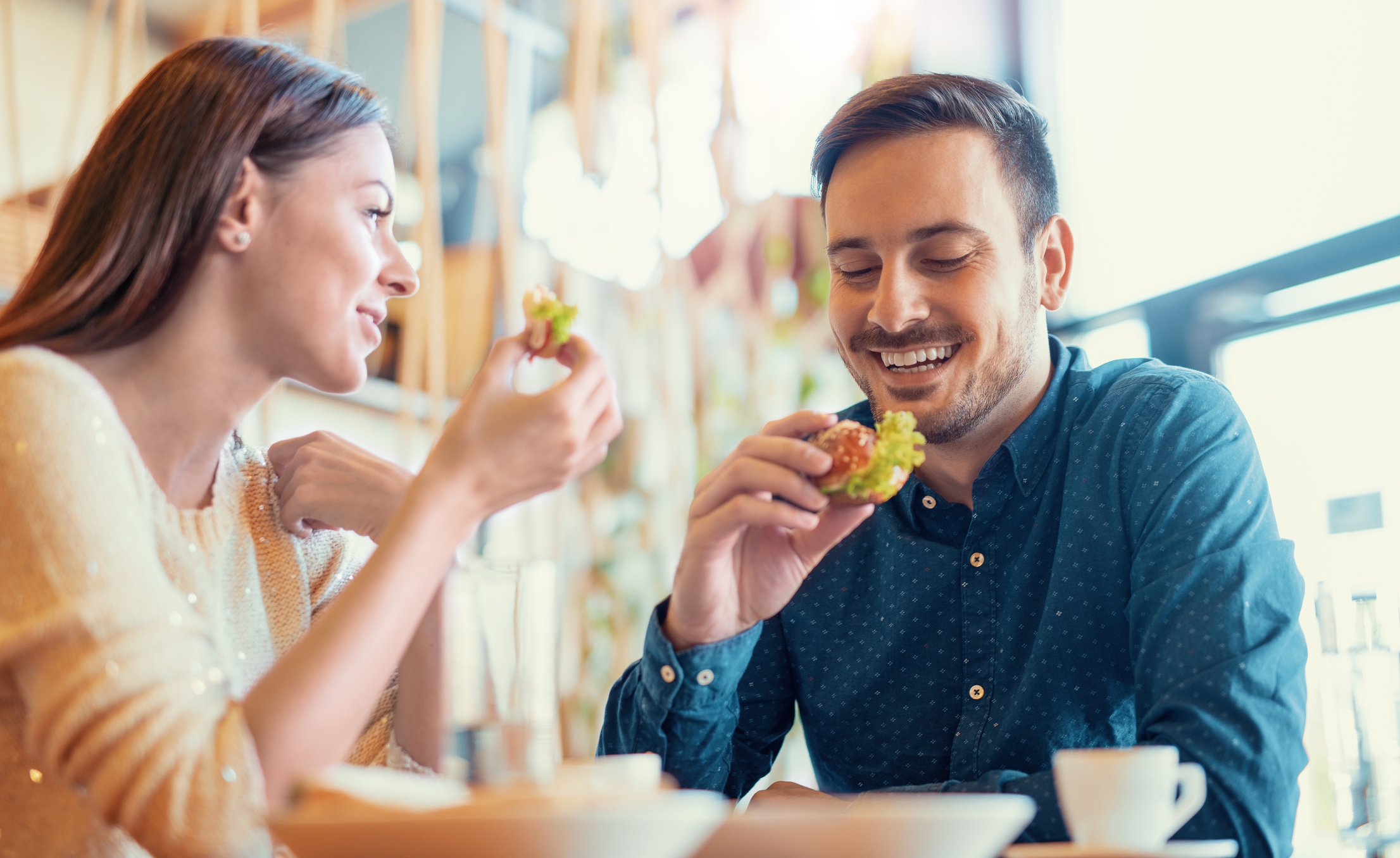 A young couple has breakfast together.