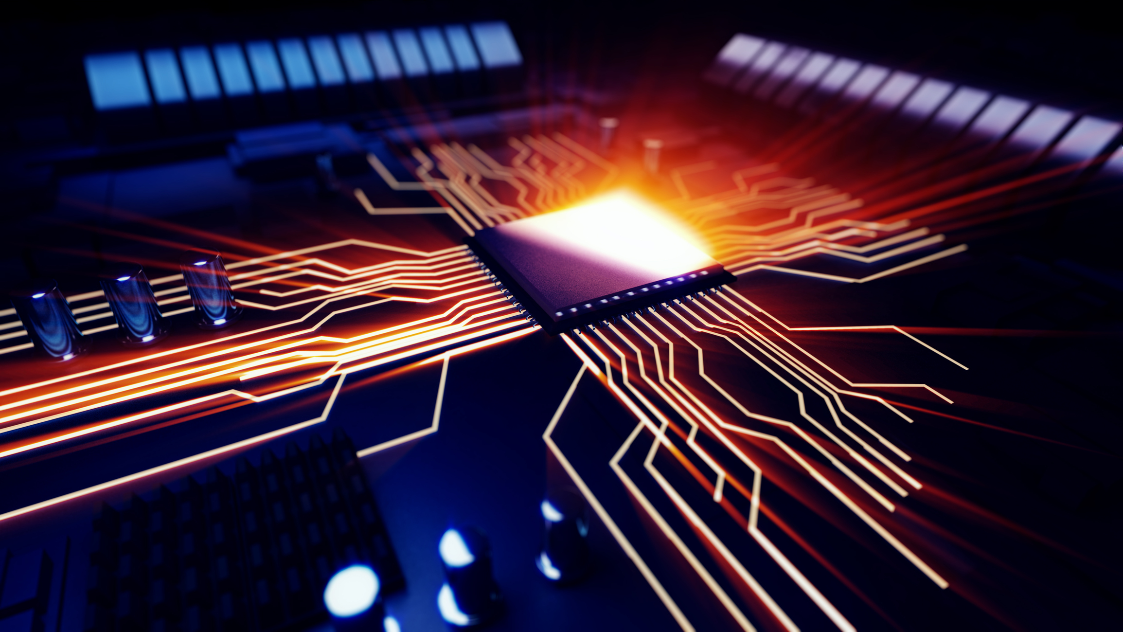 A computer chip lit up on a board A computer chip lit up on a board.