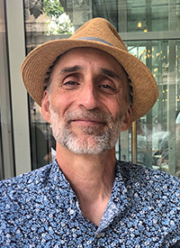 Headshot of Mariano Torras, PhD, Professor of Economics at Adelphi University