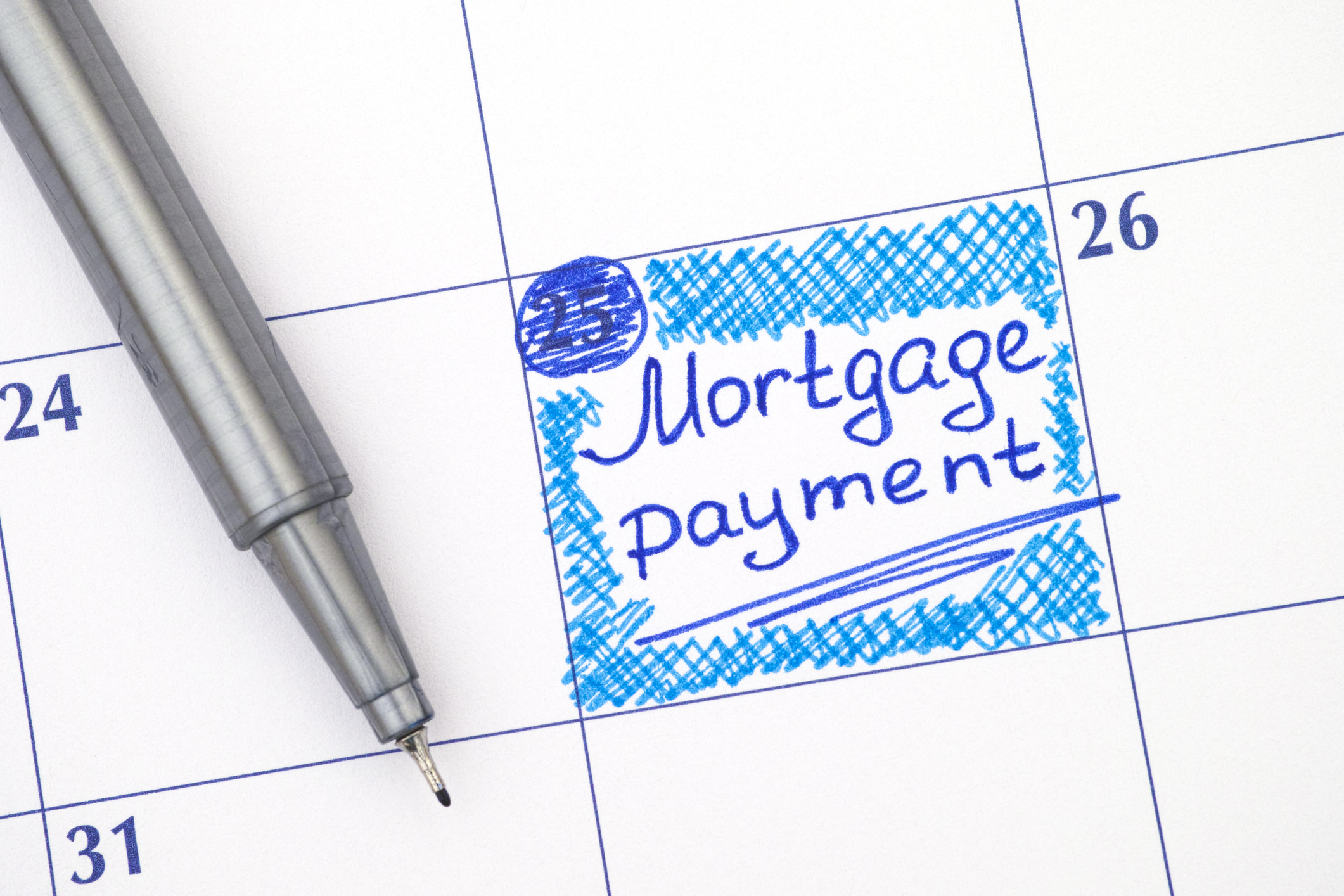 Mortgage Payment on calendar.jpeg A mortgage payment marked in blue on a large calendar page.