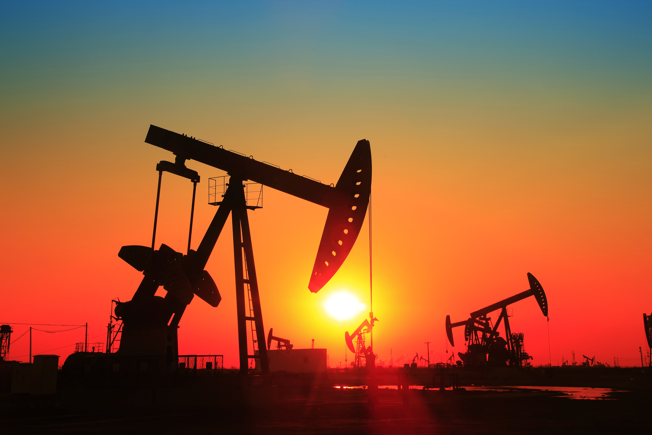 Oil rig at sunset