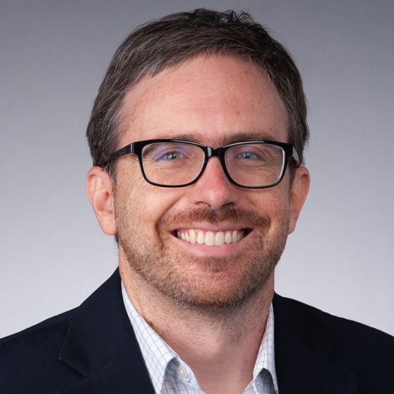 Headshot of Ryan Monarch, professor of economics at Syracuse University.