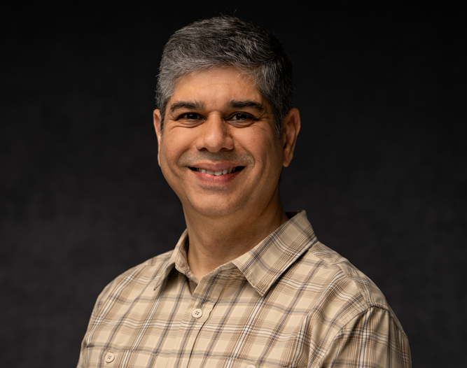 Headshot image of Asit Sharma.
