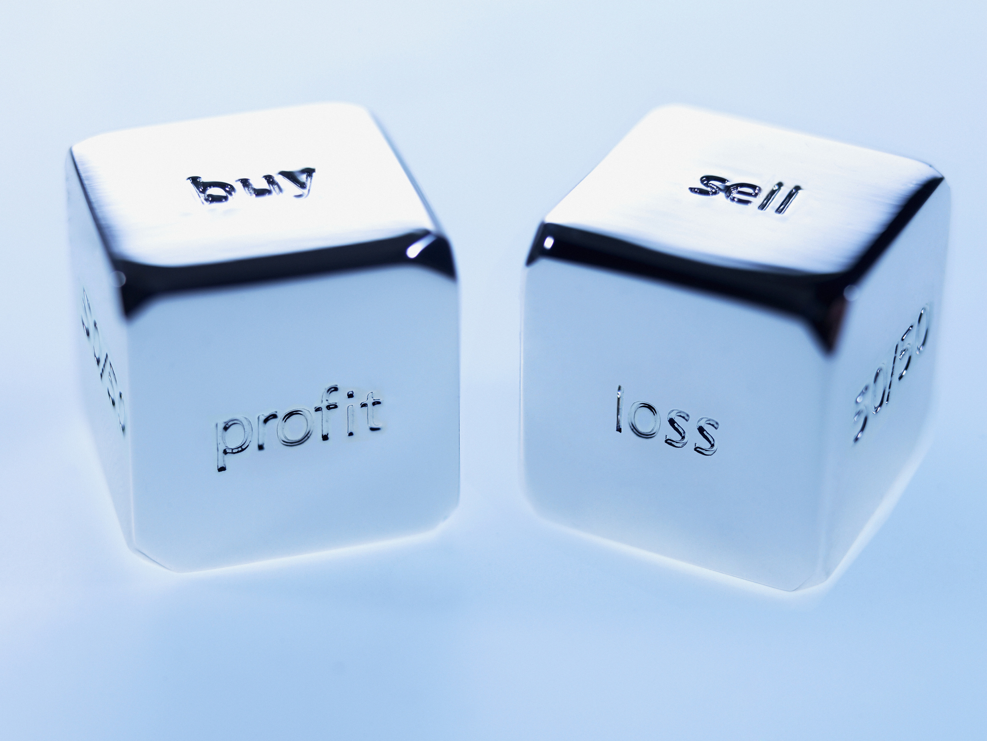 Dice spelling out Buy, Sell, Loss, Profits, and more Dice spelling out Buy, Sell, Loss, Profits, and more.