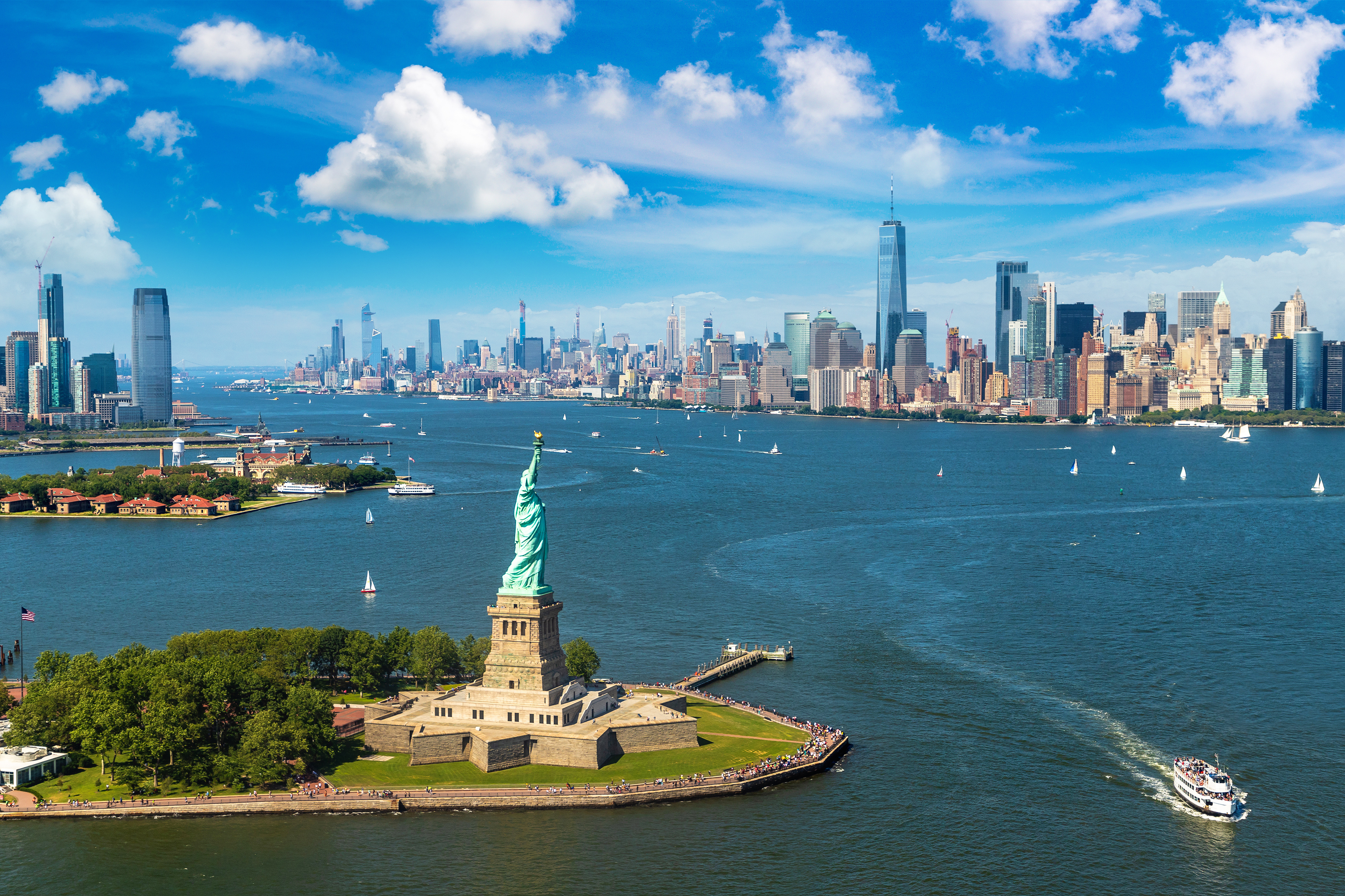 Statue of Liberty and New York Harbor aerial photo An aerial shot of the Statue of Liberty and New York Harbor and some of the city.
