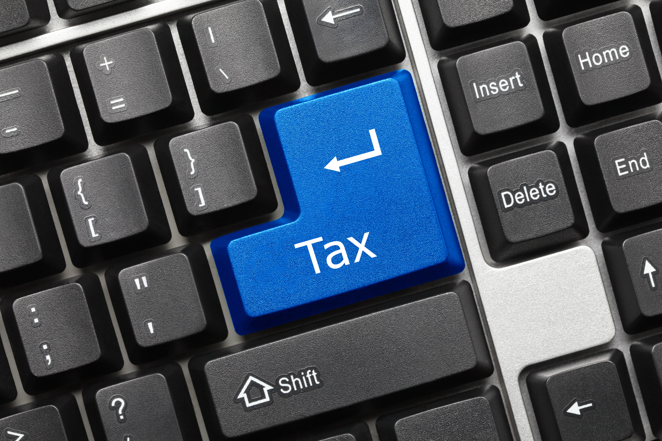 blue tax button on a keyboard