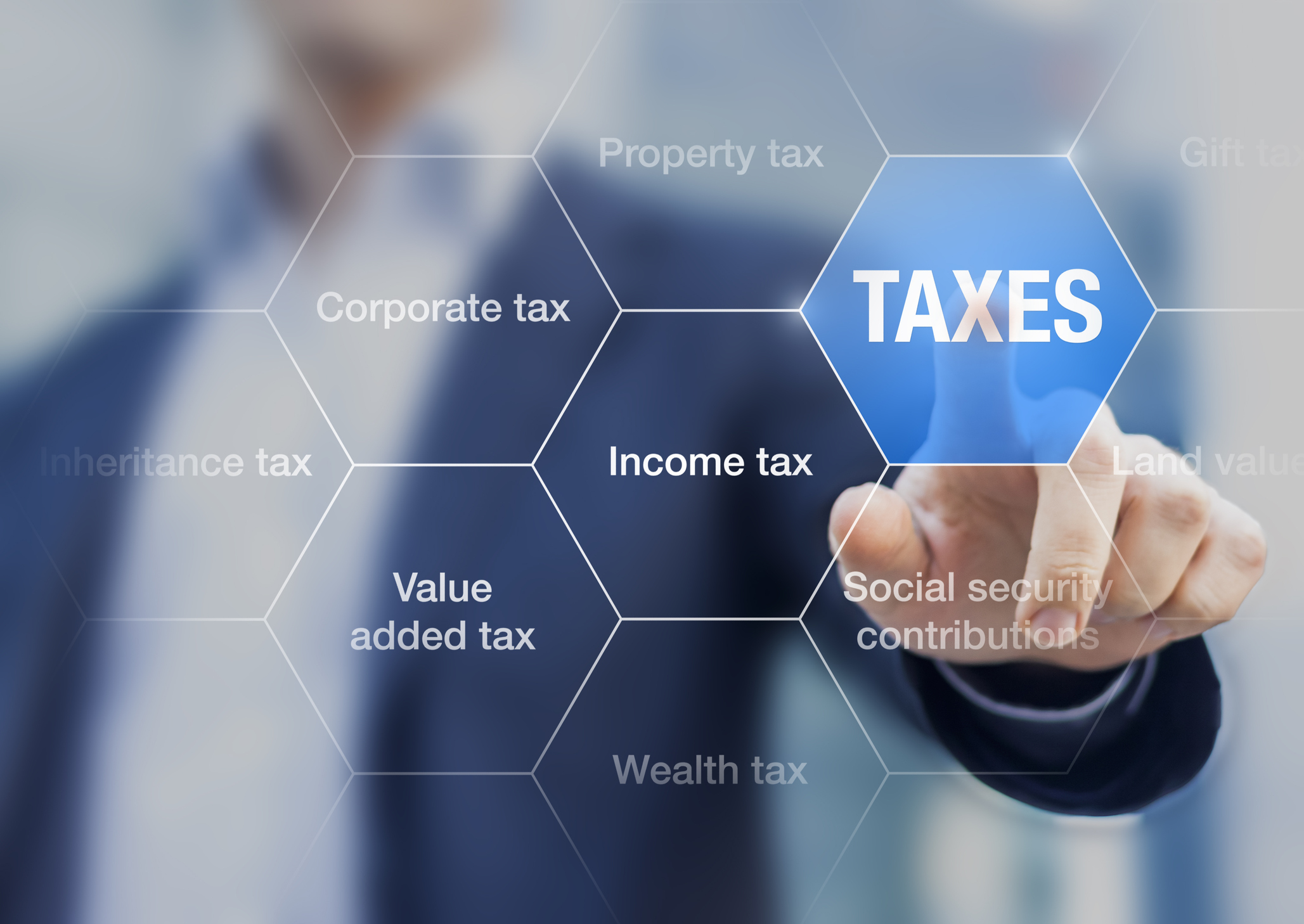 Man pointing to “taxes” icon next to other tax-related icons Person pointing to Taxes icon next to other tax-related icons.