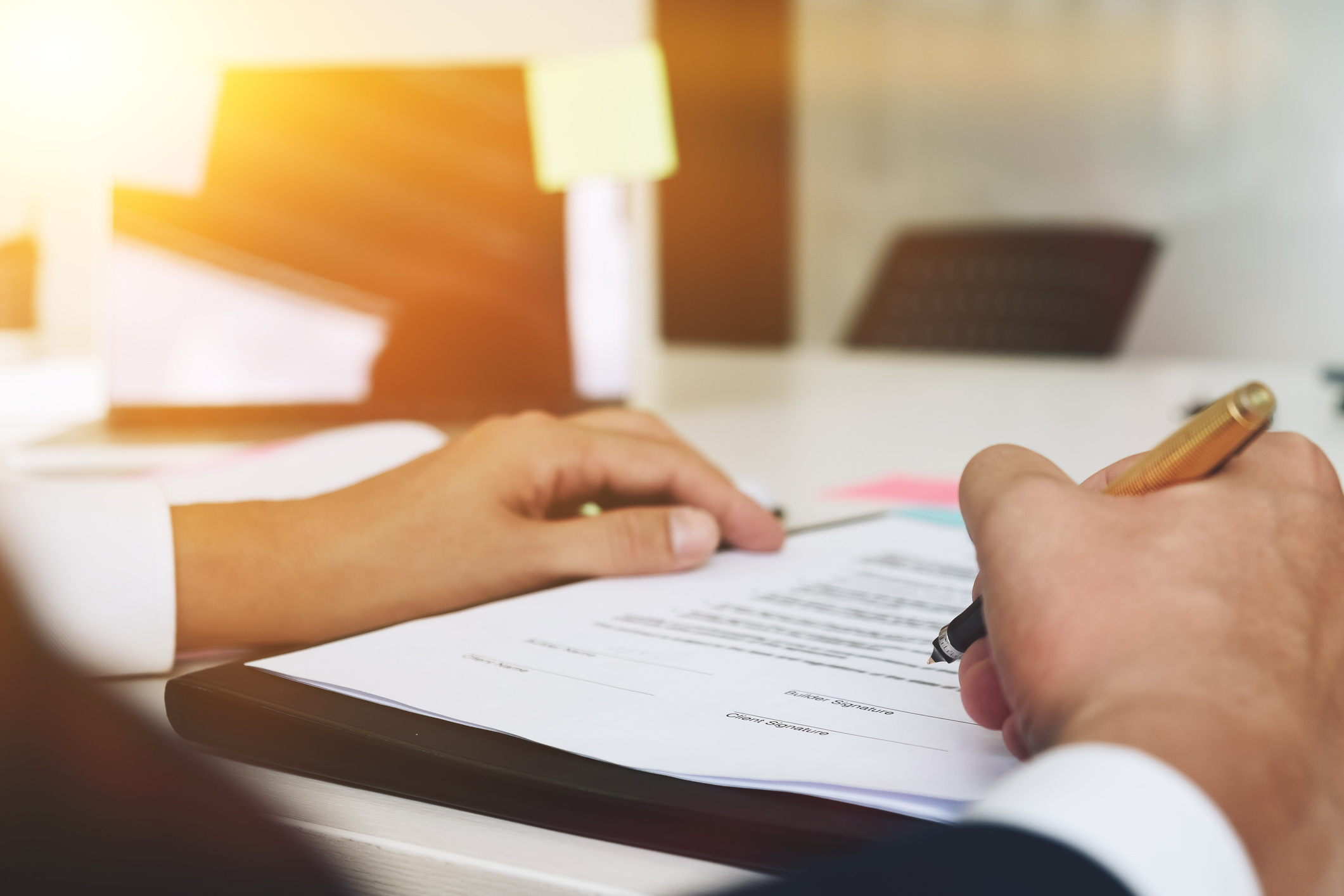 Businessperson reviewing income statement A businessperson reviewing an income statement.