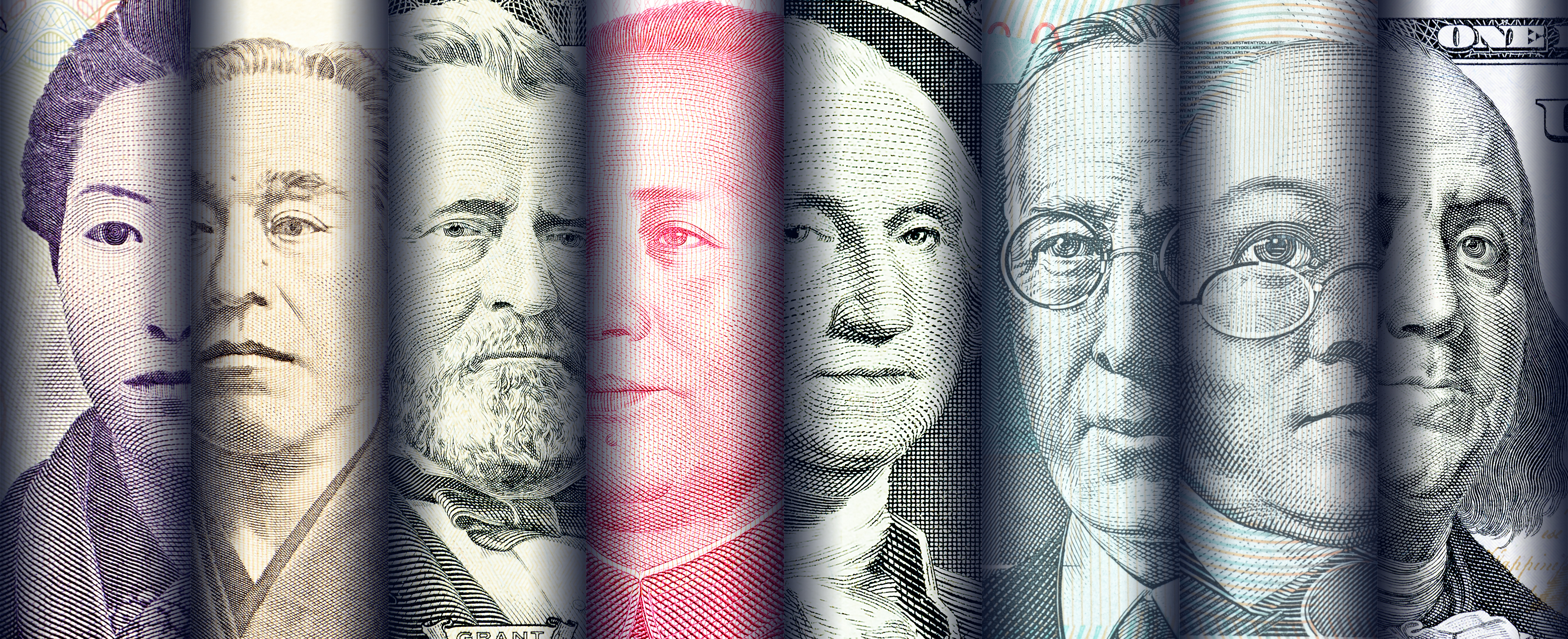 US and foreign banknotes rolled up next to each other -- cash money currency exchange rate global trade