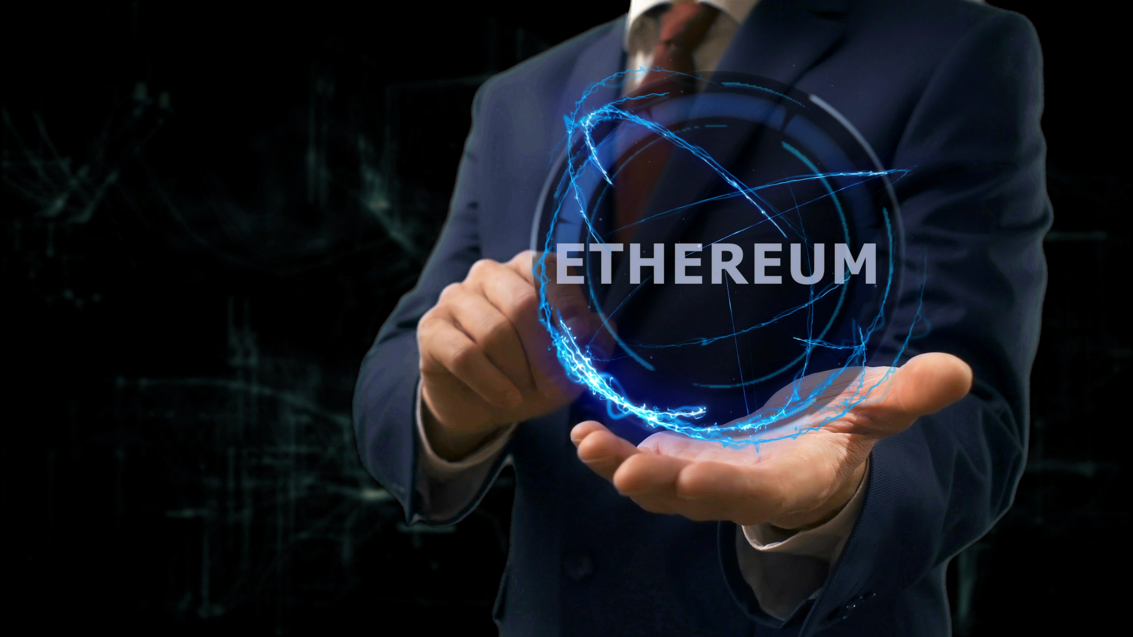 ethereum Person with outstretched hand holding digital globe that says Ethereum.