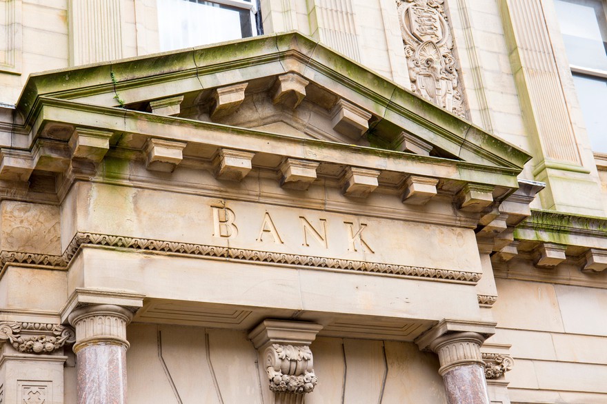 Exterior of a bank building. Exterior of a bank building.