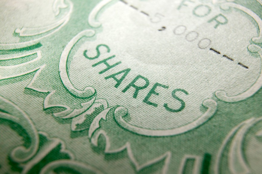 Zoomed in picture of a stock certificate. Zoomed in picture of a stock certificate.